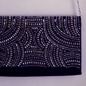 black clutch+ shoulder strap+ metal design